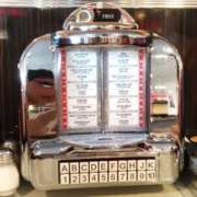 Jukebox na mesa do Johnny Rockets - Capa
