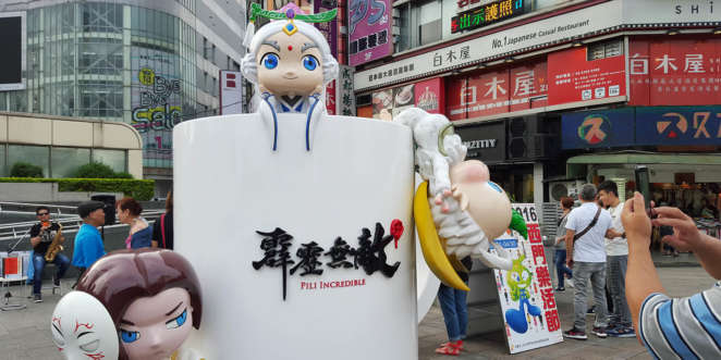 Estátuas de anime no bairro moderno de Ximending em Taipei Estátuas de anime no bairro moderno de Ximending em Taipei