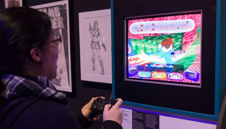 Coisa na exposição A Era dos Games, na Bienal do Ibirapuera, jogando PaRappa the Rapper, clássico jogo musical em que o seu ritmo realmente dita a evolução da música no jogo Coisa na exposição A Era dos Games, na Bienal do Ibirapuera, jogando PaRappa the Rapper, clássico jogo musical em que o seu ritmo realmente dita a evolução da música no jogo